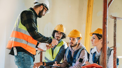 workers discussing together